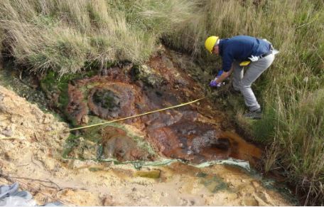 Researchers measuring the stream in St Oswald’s Bay. Courtesy of Imperial College.